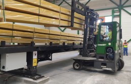 Forklift loading LVL materials on Actiw LoadPlate equipment.